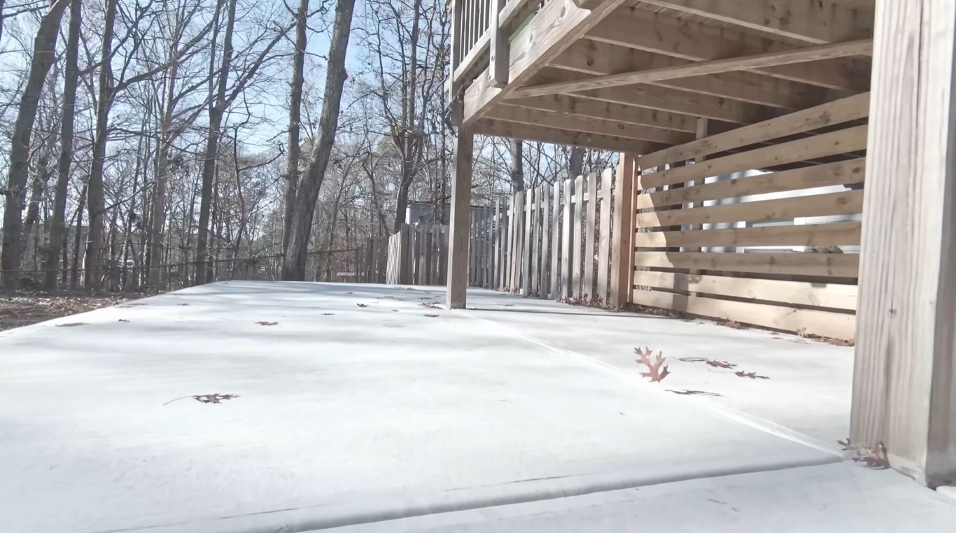 Low-maintenance concrete patio that outlasts wood decks